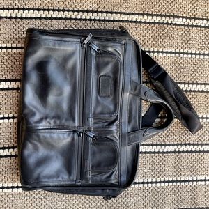 Tumi all leather briefcase gently used